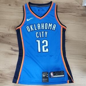Nike Blue Basketball Jersey with Orange and Black Accents